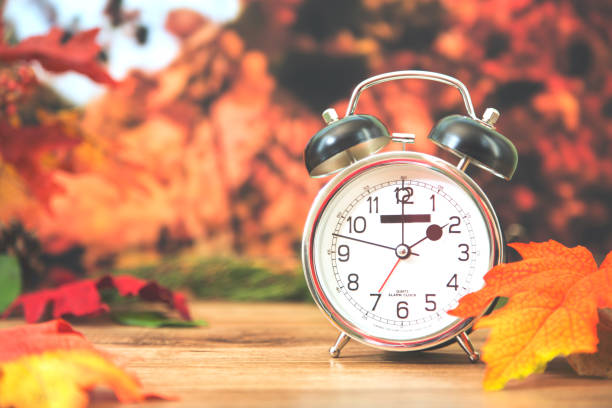 istock Daylight savings time.  2 o'clock time on clock in autumn season. 857032186