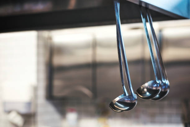 istock A lot of soup ladles hanging in kitchen. 857032780