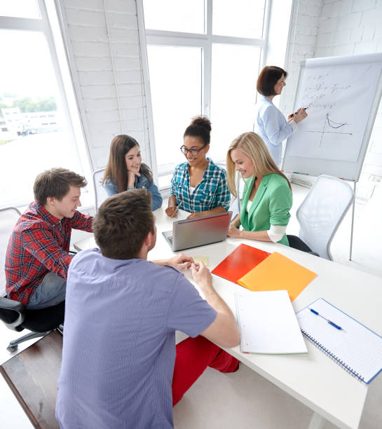 istock group of happy high school students with workbook 857036294