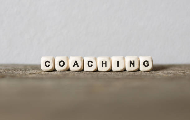 istock Word COACHING made with wood building blocks 857037266