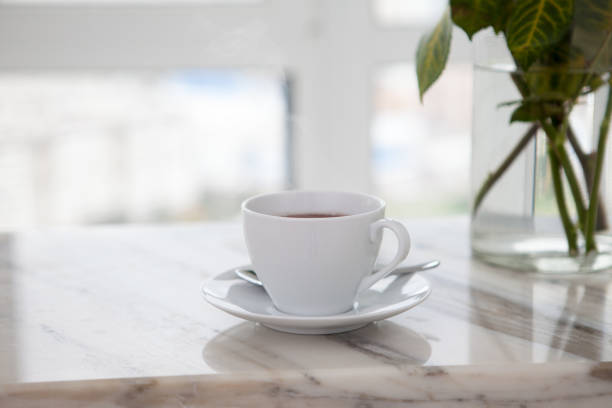 istock cup of coffee on marble table 857038058