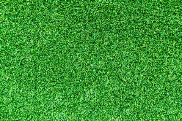 istock Artificial green grass texture for golf course. soccer field or sports background concept design. 857041252