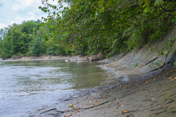 istock Sloping stony bank of a mountain river. 857048598