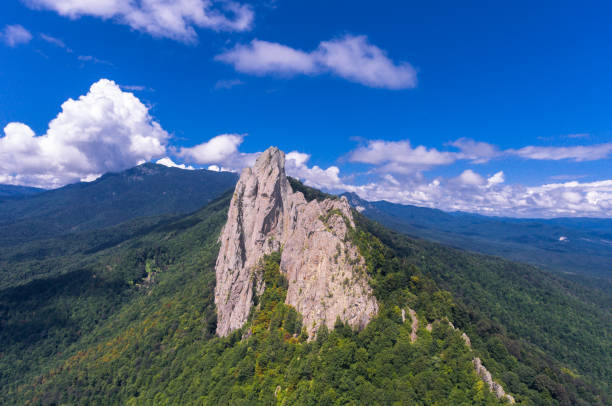 istock The rock mass sticking out from the forest. 857048648
