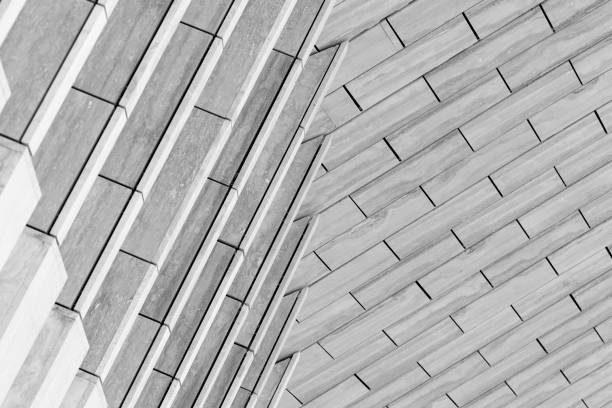 istock Abstract architecture, detail of a modern building, stone  wall and roof 857048762