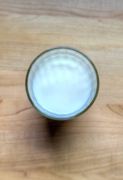 istock A glass of milk on a wood table 857065050