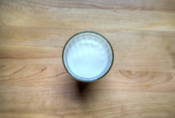 istock A glass of milk on a wood table 857065062