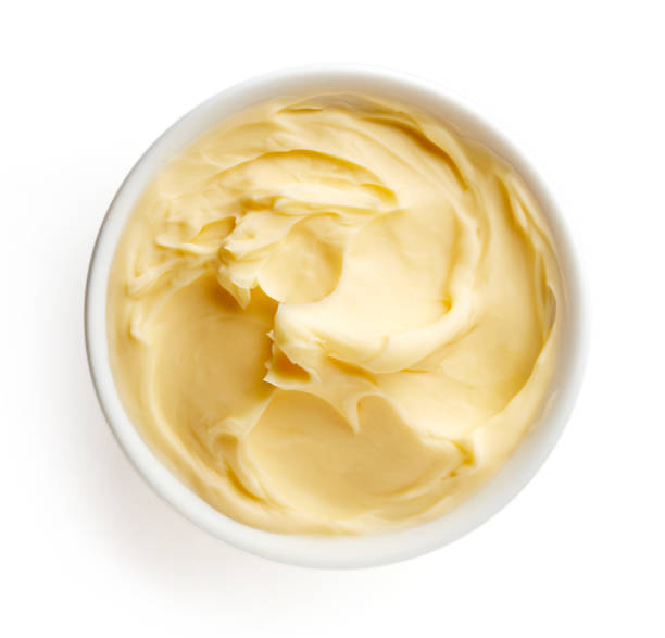 istock Bowl of butter isolated on white background, top view 857074930