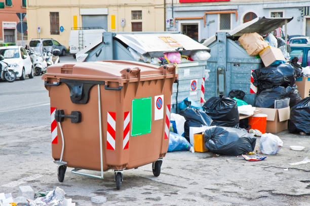 istock Overflowing garbage bins in a italian city 857074980