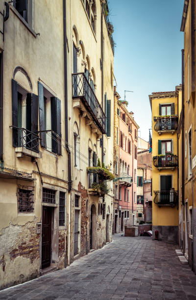 istock The old street in Venice, Italy 857075144