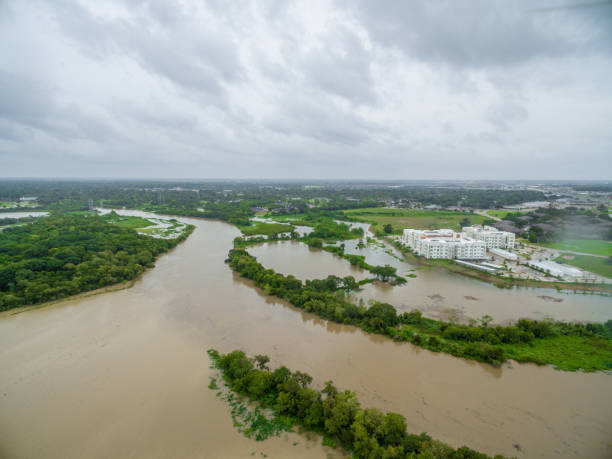 Flooded streets during Hurricane Harvey Flooded streets during Hurricane Harvey near Houston Texas superstorm stock pictures, royalty-free photos & images