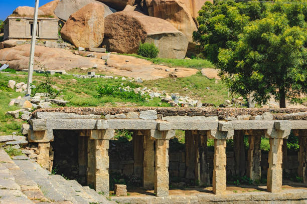 istock Ancient ruins on Krishna Bazaar in Hampi, India 857075650