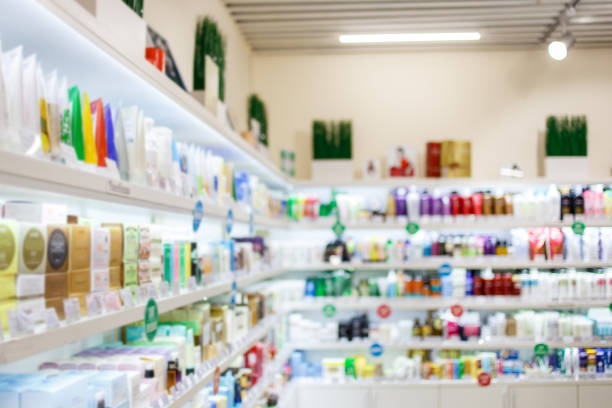 istock Various products on shelves at cosmetics store. Blurred image 857075912