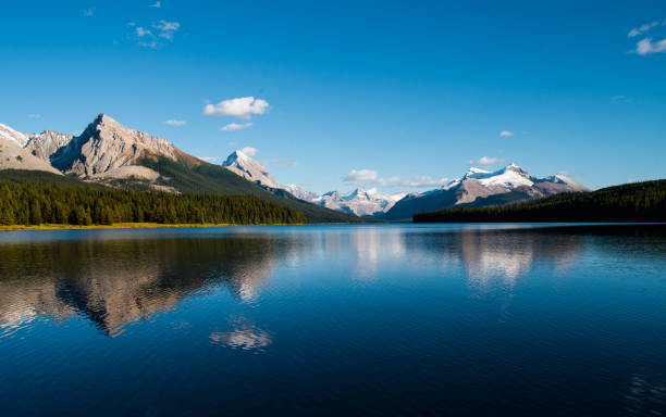 istock Water reflection of snow capped mountain 857086210