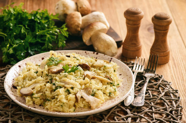 istock Homemade risotto with boletus and parsley. 857091200