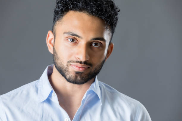 istock Portrait of serious young Indian man 857097900