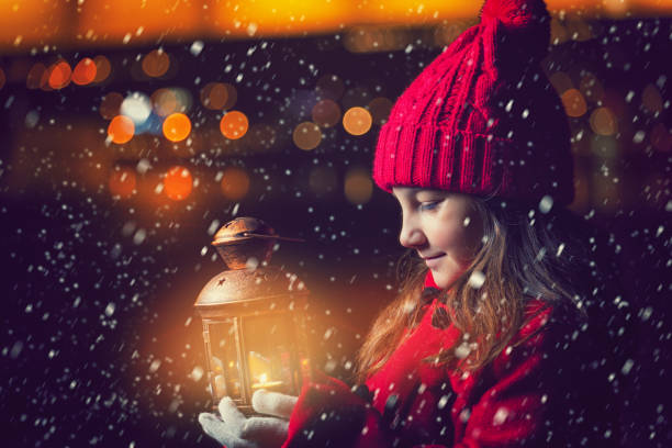 istock Beautiful Little Girl With Lantern Outside 857099458