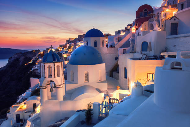 istock Oia village, Santorini island, Greece on a sunset 857103044