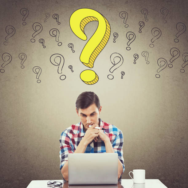 istock Thoughtful businessman using laptop at desk 857106994