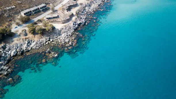 Photo of Aerial View: Drone video of iconic beach of Agathi and castle of Feraklos, Rodos island, Aegean, Greece