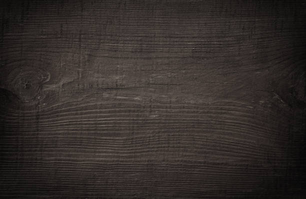 istock Dark scratched grunge cutting board. 857117928