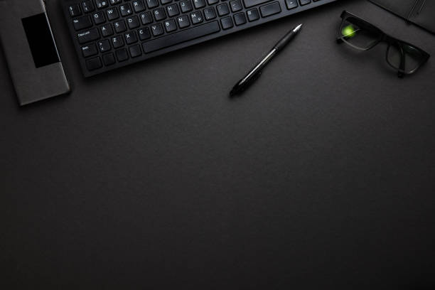 istock Computer Keyboard With Smartphone, Pen And Eyeglasses On Gray De 857121230