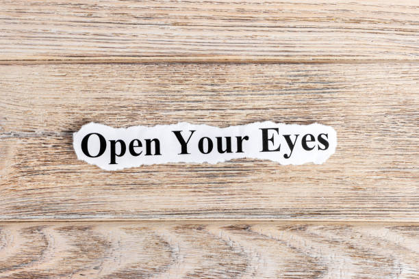 istock Open Your Eyes text on paper. Word Open Your Eyes on torn paper. Concept Image 857126008