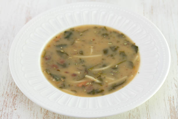 istock vegetable soup in white plate 857126382