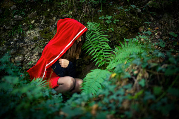 istock red riding hood in forest 857138380