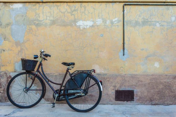 istock vintage bike on old wall 857141194
