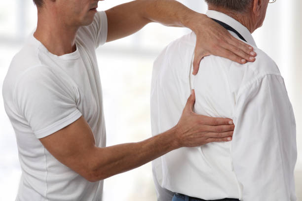 istock Man having chiropractic back adjustment. Osteopathy, Physiotherapy concept. 857145982