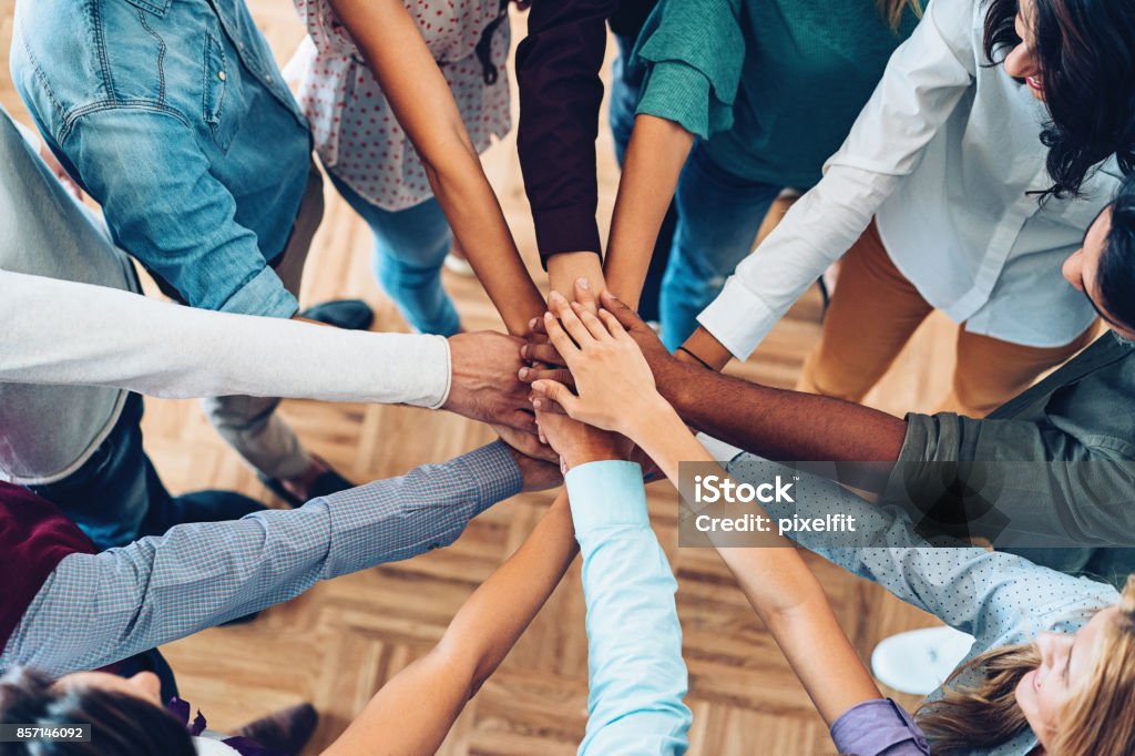 Sea of hands Large sea of hands Teamwork Stock Photo