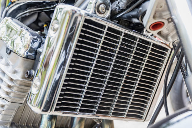 Close up of chrome motorcycle exhaust pipes.