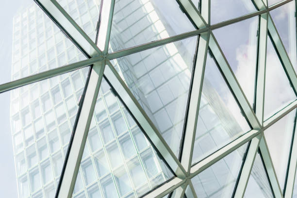 istock Abstract background construction. close-up of modern aluminum triangles on facade 857153138
