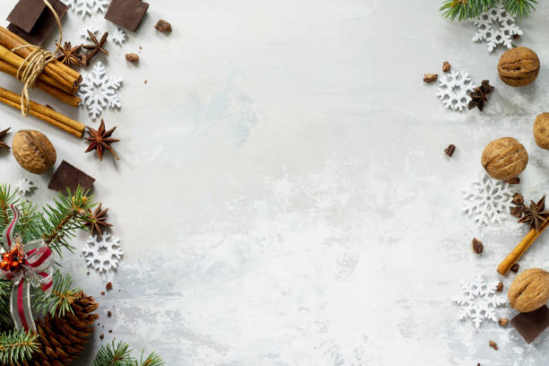 istock Ingredients for Christmas baking - chocolate, cinnamon, anise and nuts on a stone or slate background. Seasonal, food background. 857156458