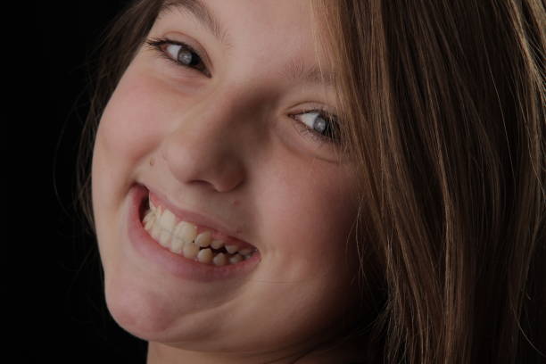 istock girl smile 857160236