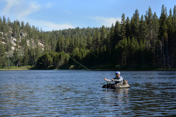 istock A man fly fishes from a float tube on a summer afternoon. 857171070