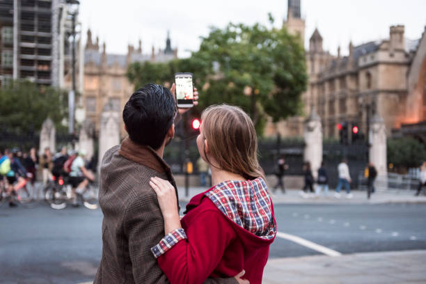 istock Couple take a selfie at Big ben in London 857174092