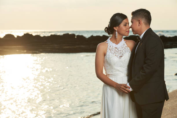 istock Groom going to kiss bride 857175932