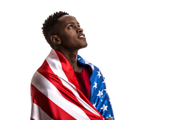 istock American fan holding the national flag 857178422