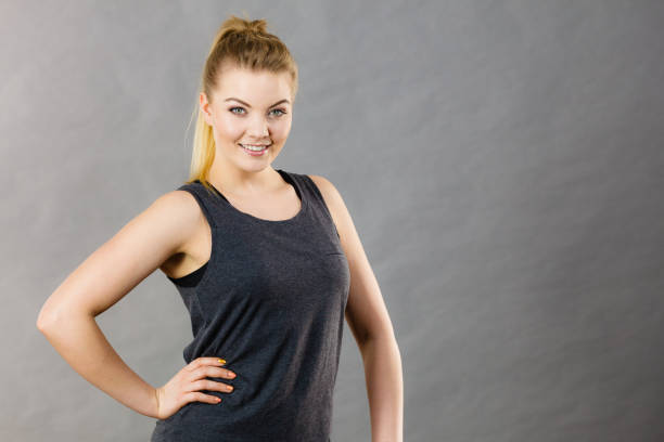 istock Happy woman wearing black tank top 857190730