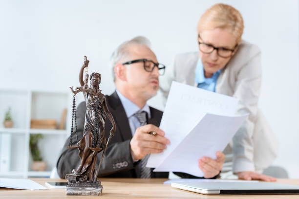istock lawyers working together in modern office 857197242