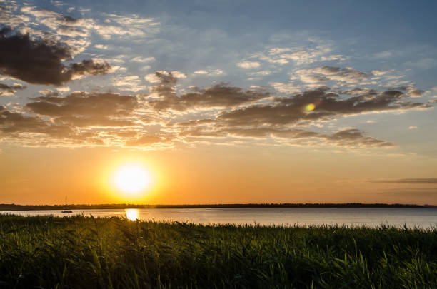 istock beautiful sunset over the pond 857198652