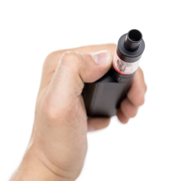 istock Black vape in a man's hand on a white isolated background 857201418
