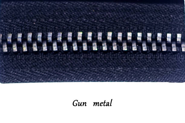 istock gun metal zipper, white background 857220258