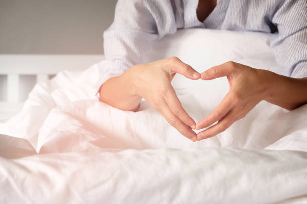 istock Woman is showing a gesture by hand in heart shape 857228056