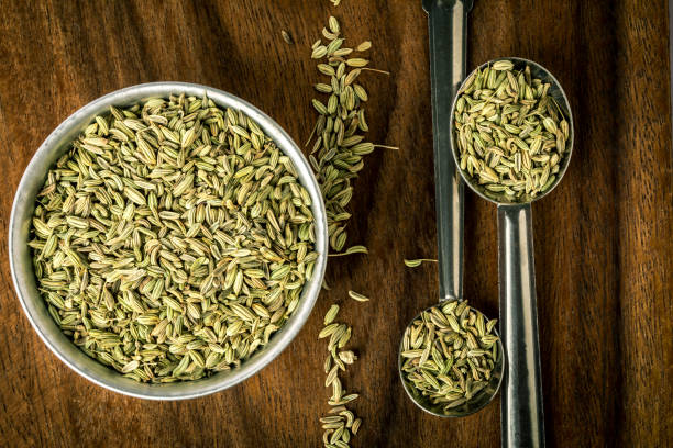 istock close up fennel seed in  spoon on brown wooden table 857228986
