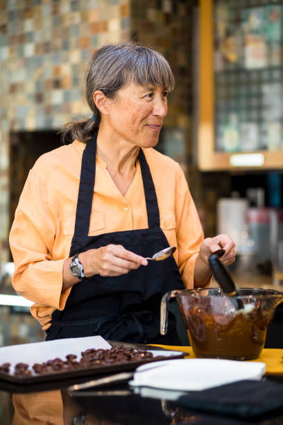 istock Senior Woman Chef in Kitchen 857234020