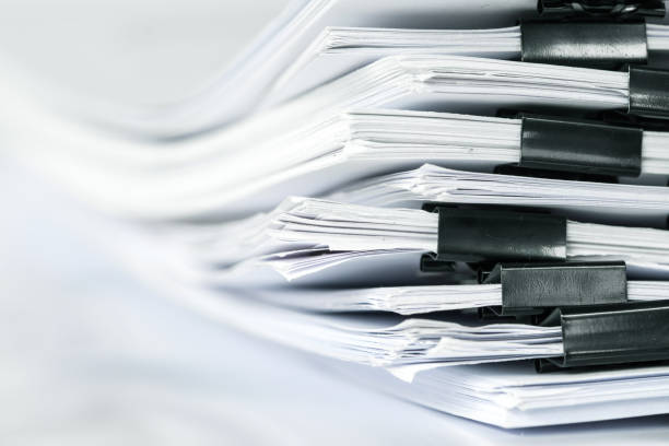 istock extreamly close up the stacking of office working document with paper clip folder 857234246