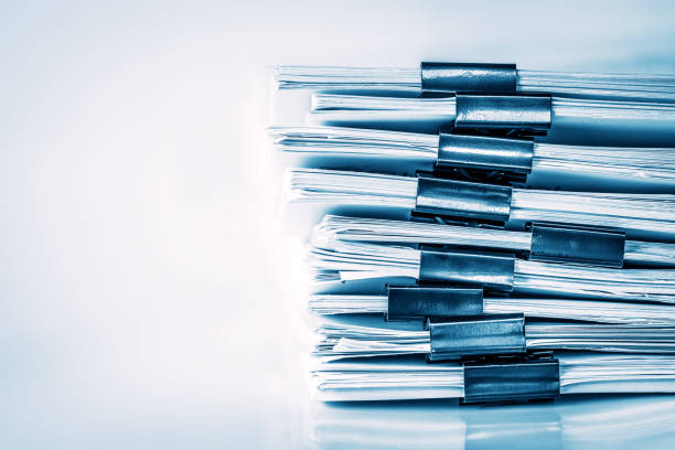 istock extreamly close up  the stacking of office working document with paper clip folder 857237846